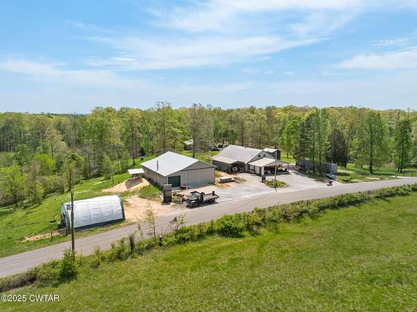 35.6 Acres of Land with Home for Sale in Yuma, Tennessee