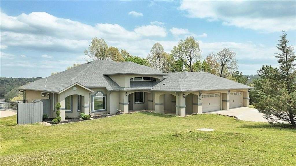 5 Acres of Residential Land with Home for Sale in Lowell, Arkansas