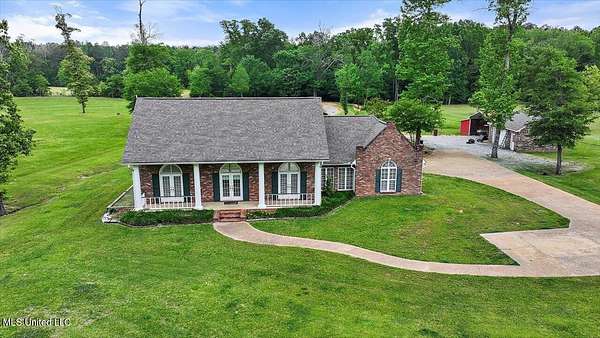 7 Acres of Residential Land with Home for Sale in Canton, Mississippi