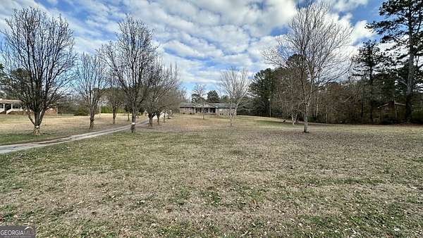 9.74 Acres of Residential Land with Home for Sale in McDonough, Georgia