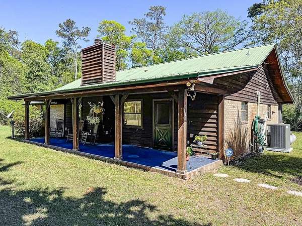 2 Acres of Residential Land with Home for Sale in Sopchoppy, Florida