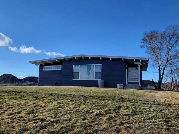 4.2 Acres of Residential Land with Home for Sale in Glendive, Montana