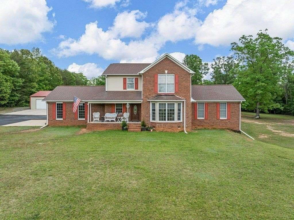 6.89 Acres of Land with Home for Sale in Landrum, South Carolina