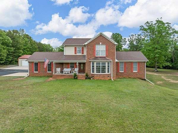 6.89 Acres of Land with Home for Sale in Landrum, South Carolina