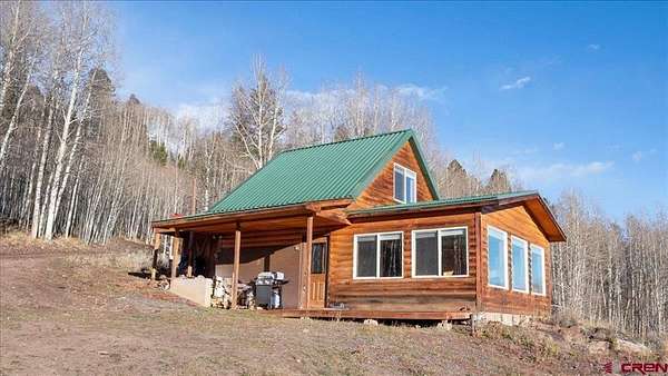 36 Acres of Recreational Land with Home for Sale in Powderhorn, Colorado