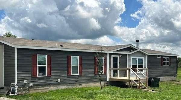 5.16 Acres of Residential Land with Home for Sale in Nevada, Missouri