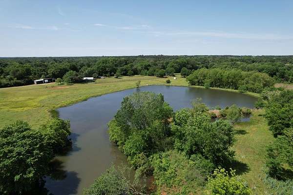 22.3 Acres of Recreational Land with Home for Sale in Grapeland, Texas