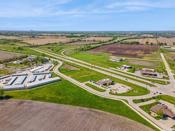 1.85 Acres of Commercial Land for Sale in Carlisle, Iowa