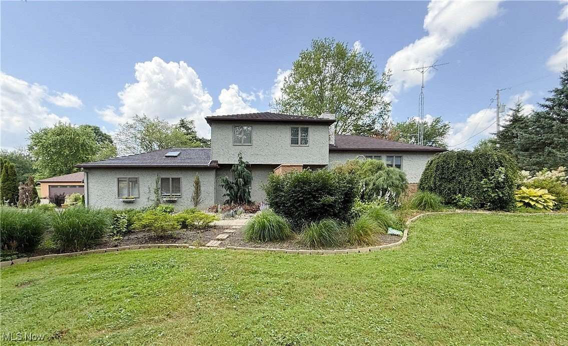 3.8 Acres of Residential Land with Home for Sale in Columbiana, Ohio