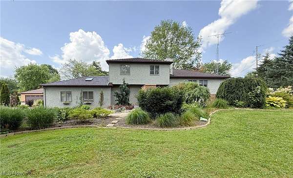 3.8 Acres of Residential Land with Home for Sale in Columbiana, Ohio