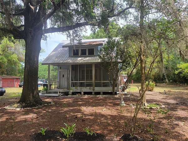 2.56 Acres of Residential Land with Home for Sale in Ocala, Florida