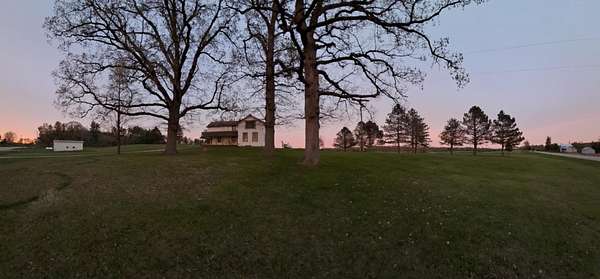 5.33 Acres of Residential Land with Home for Auction in Camden, Michigan
