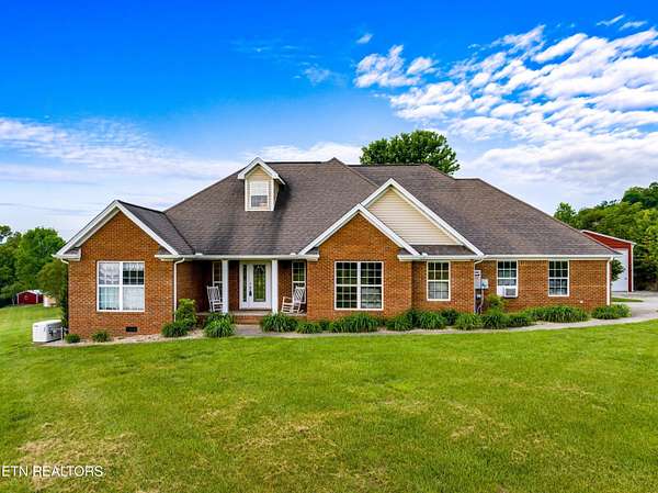 21.7 Acres of Agricultural Land with Home for Sale in Dandridge, Tennessee