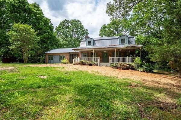 14 Acres of Land with Home for Sale in Dallas, Georgia