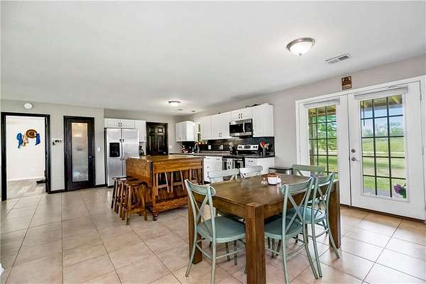 9.88 Acres of Land with Home for Sale in Polo, Missouri