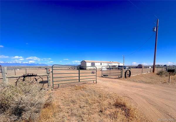40 Acres of Agricultural Land with Home for Sale in Center, Colorado