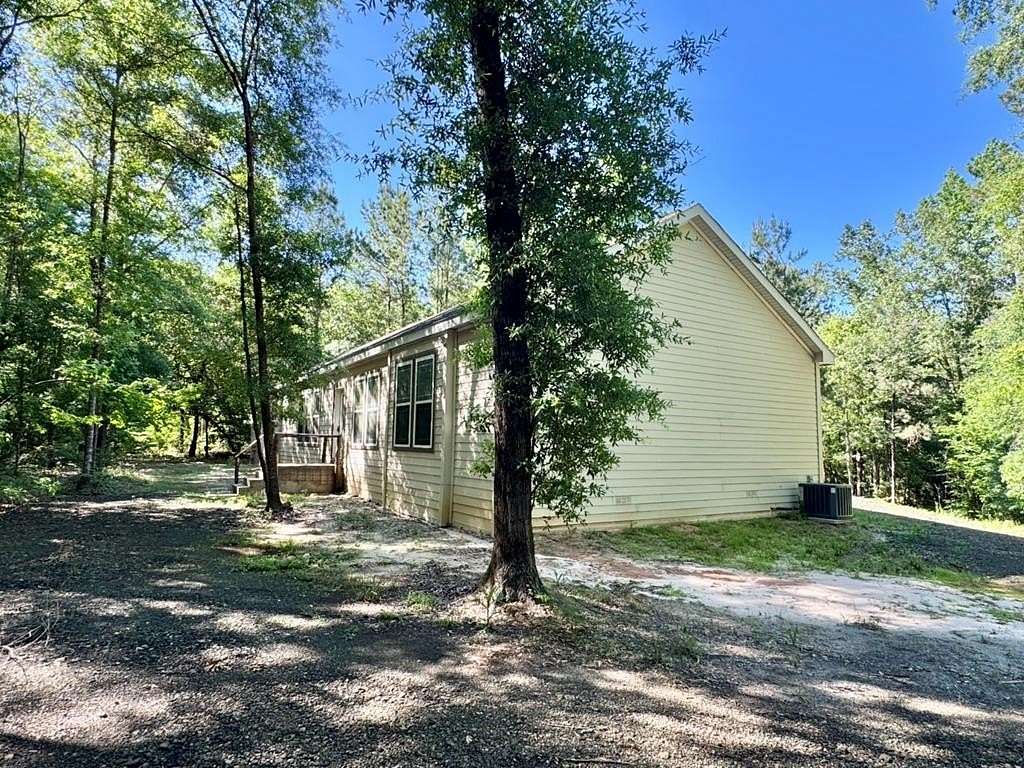 10.5 Acres of Land with Home for Sale in Spurger, Texas