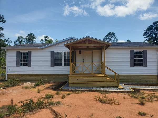 3.83 Acres of Residential Land with Home for Sale in Freeport, Florida