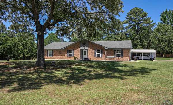 4.75 Acres of Residential Land with Home for Sale in Hallsville, Texas