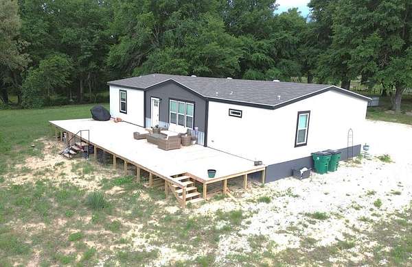 8.39 Acres of Improved Mixed-Use Land for Sale in Grapeland, Texas