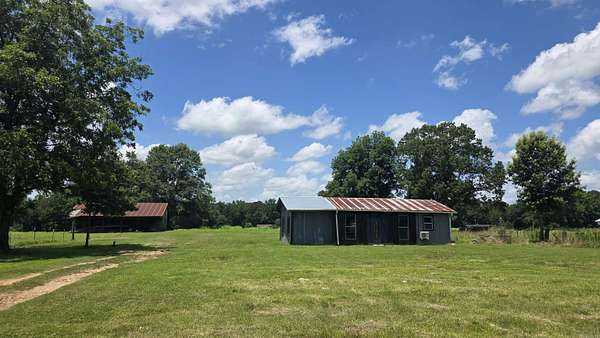3.28 Acres of Land with Home for Sale in Winthrop, Arkansas