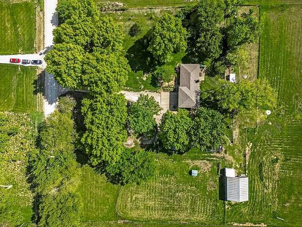 9.74 Acres of Residential Land with Home for Sale in Tonganoxie, Kansas