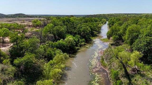 120 Acres of Land with Home for Sale in Mullin, Texas
