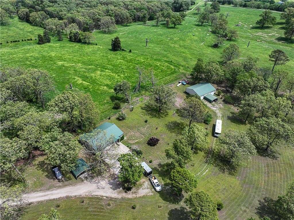 5 Acres of Residential Land with Home for Sale in Berryville, Arkansas