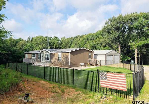 10 Acres of Land with Home for Sale in Lindale, Texas