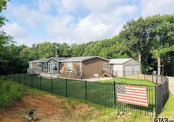 9.8 Acres of Residential Land with Home for Sale in Lindale, Texas