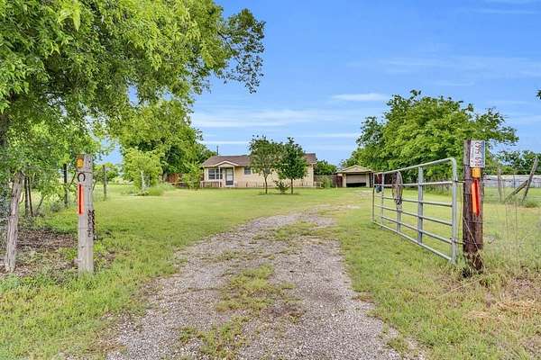 5 Acres of Land with Home for Sale in Godley, Texas