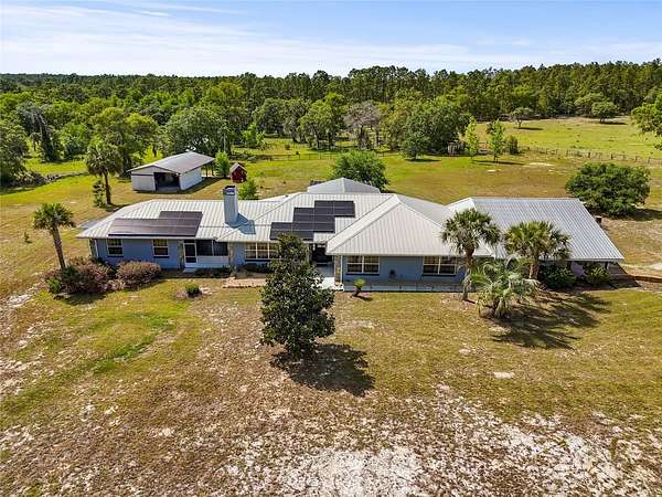 11.4 Acres of Land with Home for Sale in Morriston, Florida