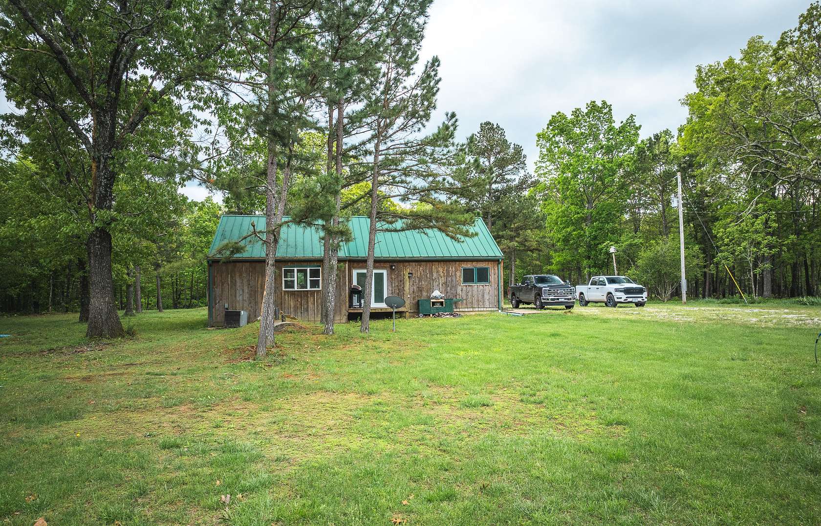 205 Acres of Recreational Land with Home for Sale in Raymondville, Missouri