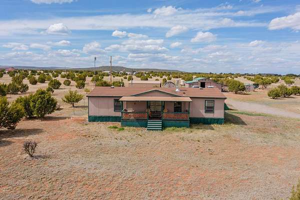 10 Acres of Land with Home for Sale in Estancia, New Mexico