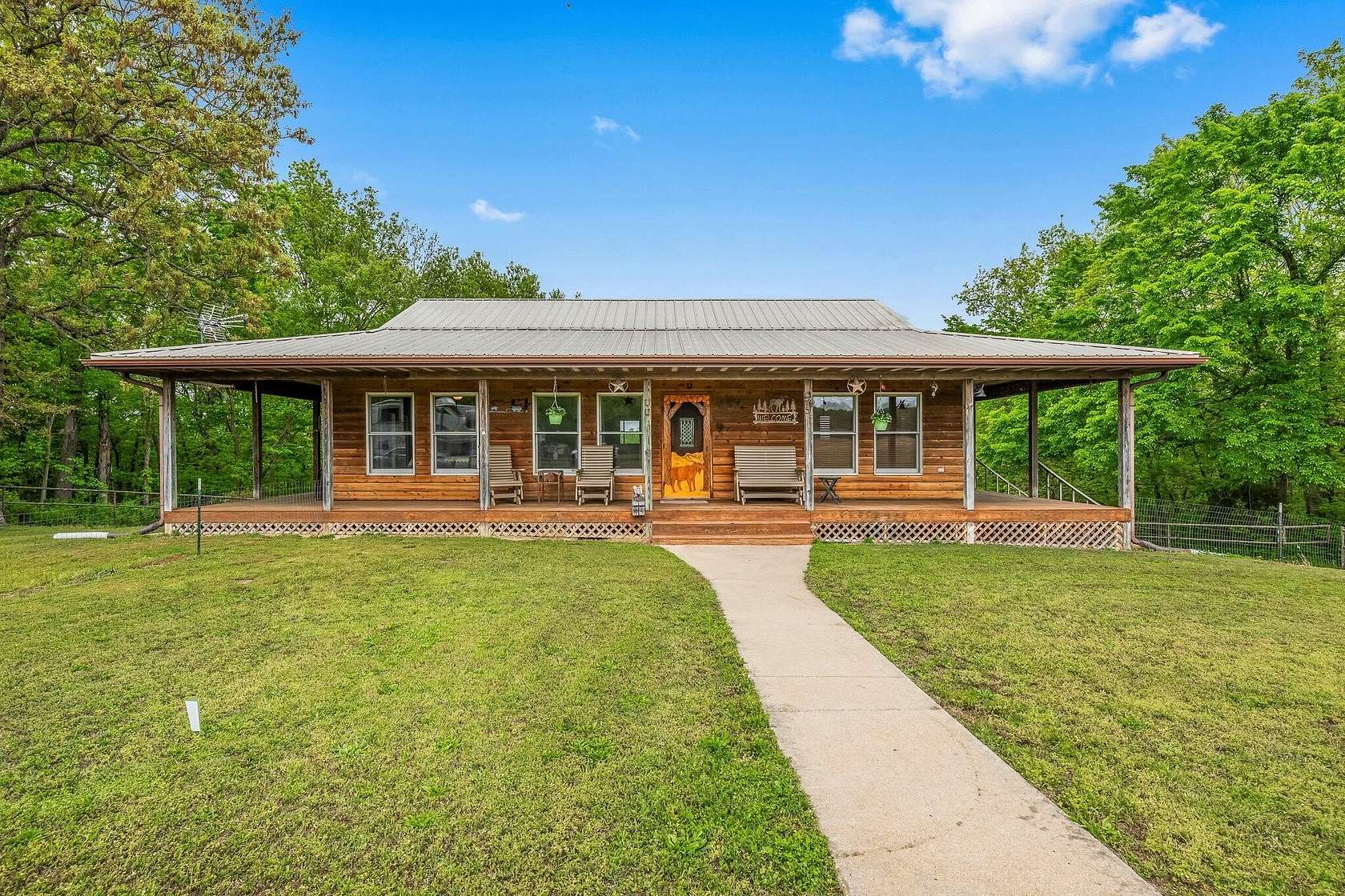 10 Acres of Residential Land with Home for Sale in Halfway, Missouri