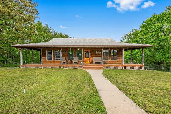 10 Acres of Residential Land with Home for Sale in Halfway, Missouri