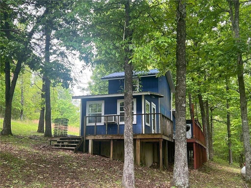 14.8 Acres of Land with Home for Sale in Marble Falls Township, Arkansas