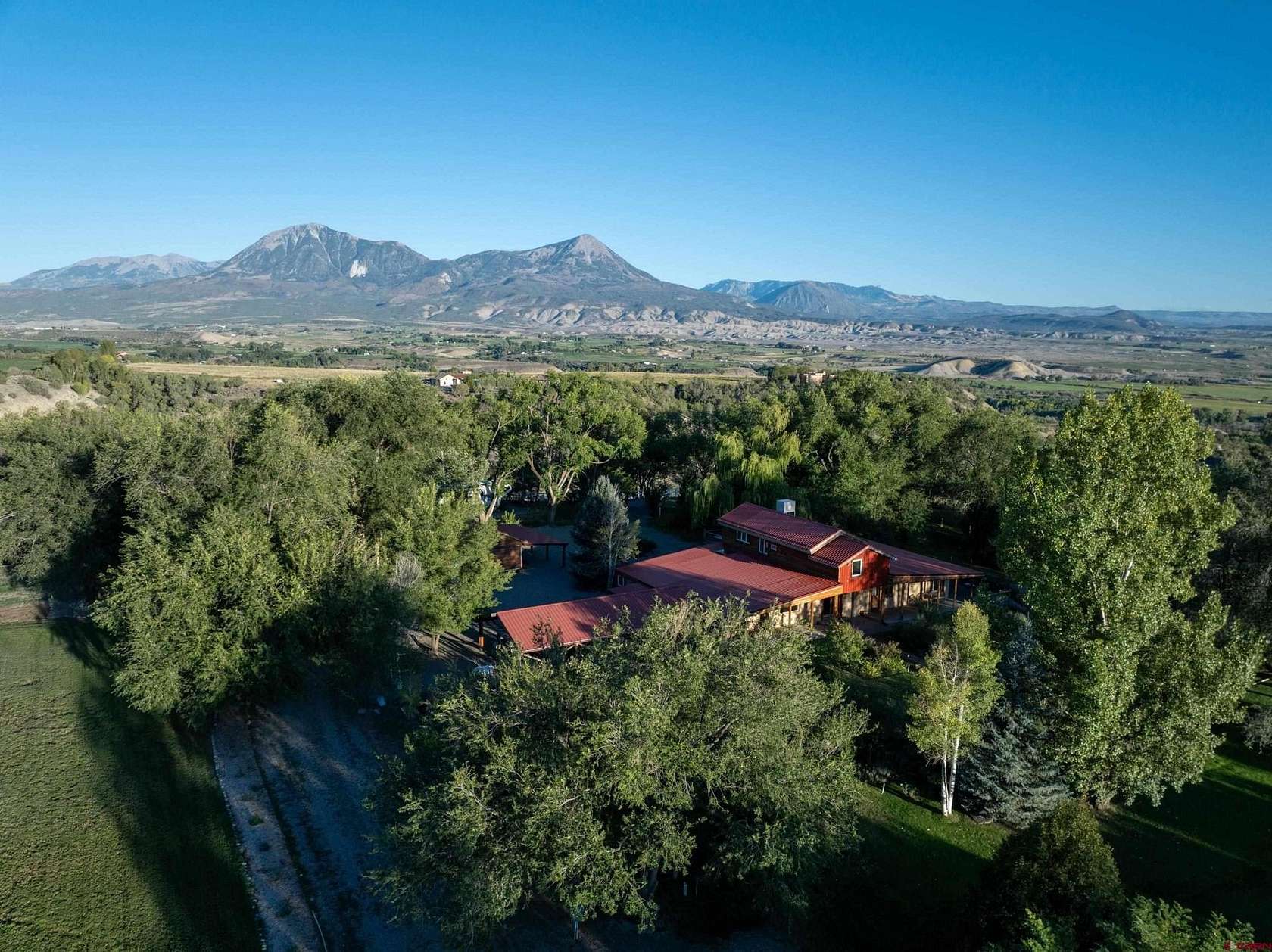 10 Acres of Land with Home for Sale in Hotchkiss, Colorado