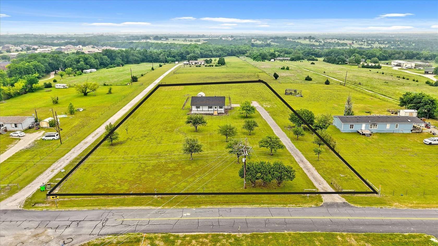 2.45 Acres of Land with Home for Sale in Farmersville, Texas