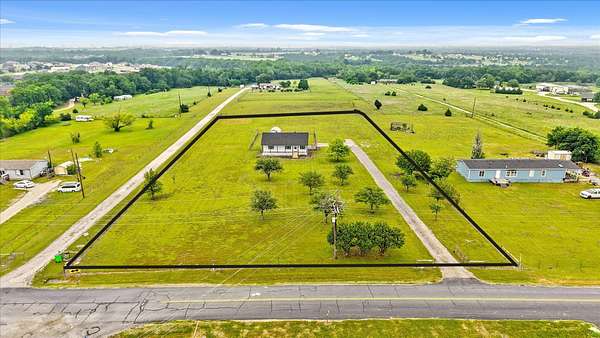 2.45 Acres of Land with Home for Sale in Farmersville, Texas