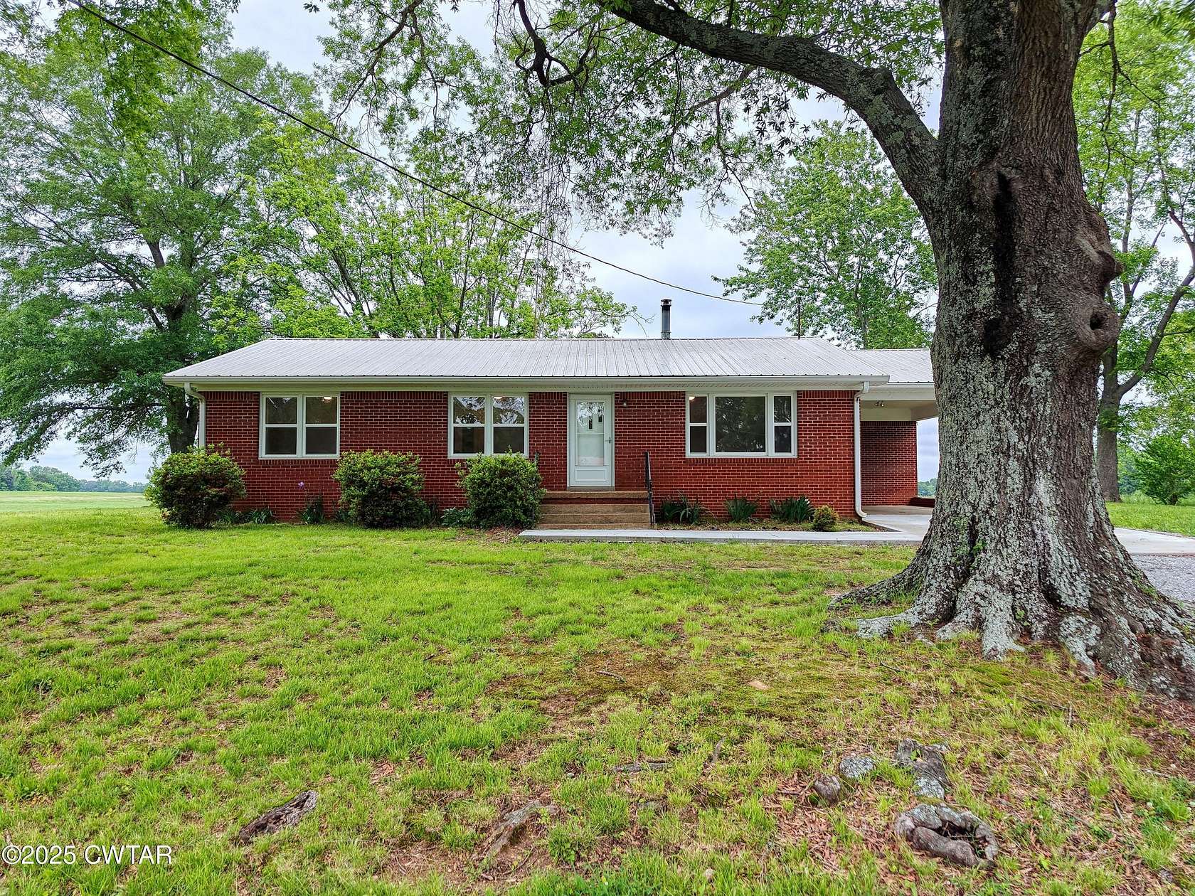 1.73 Acres of Residential Land with Home for Sale in McKenzie, Tennessee