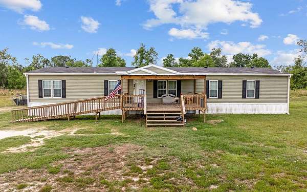 5 Acres of Residential Land with Home for Sale in Live Oak, Florida