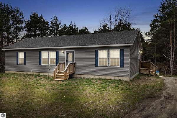 5 Acres of Residential Land with Home for Sale in Kalkaska, Michigan