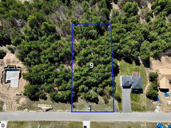 0.69 Acres of Residential Land for Sale in Grawn, Michigan