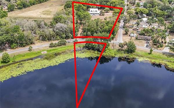 2.7 Acres of Residential Land with Home for Sale in Fruitland Park, Florida