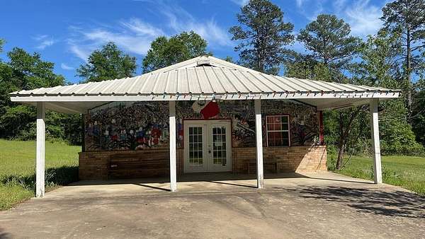 1.66 Acres of Improved Mixed-Use Land for Sale in Karnack, Texas