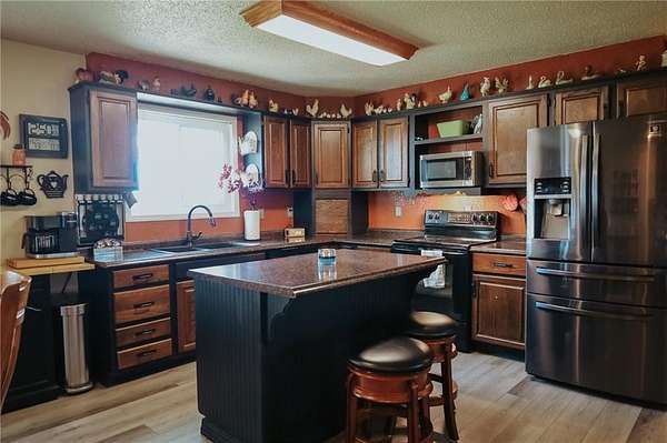 1.5 Acres of Residential Land with Home for Sale in Amazonia, Missouri