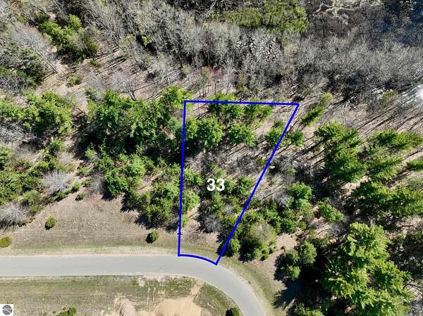 0.76 Acres of Residential Land for Sale in Grawn, Michigan