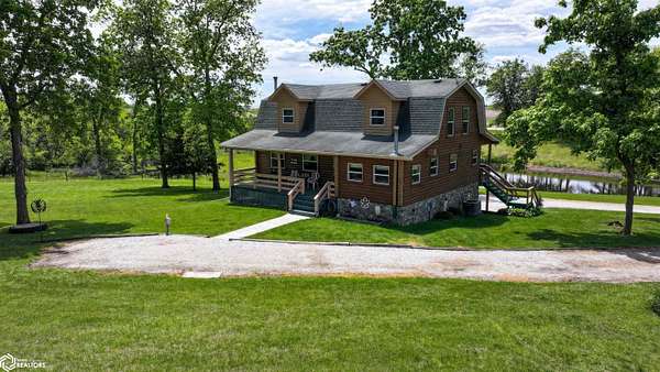 4.76 Acres of Residential Land with Home for Sale in Brighton, Iowa