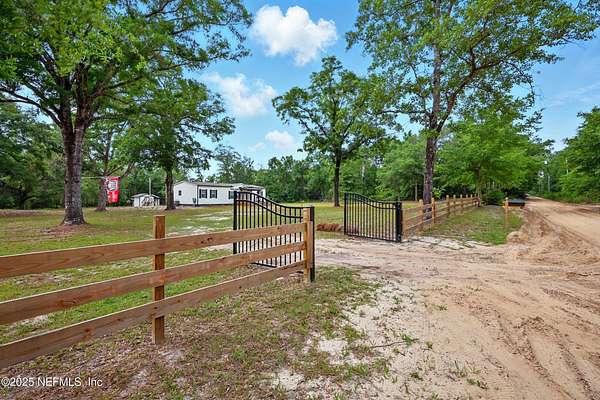 12.8 Acres of Land with Home for Sale in Hilliard, Florida